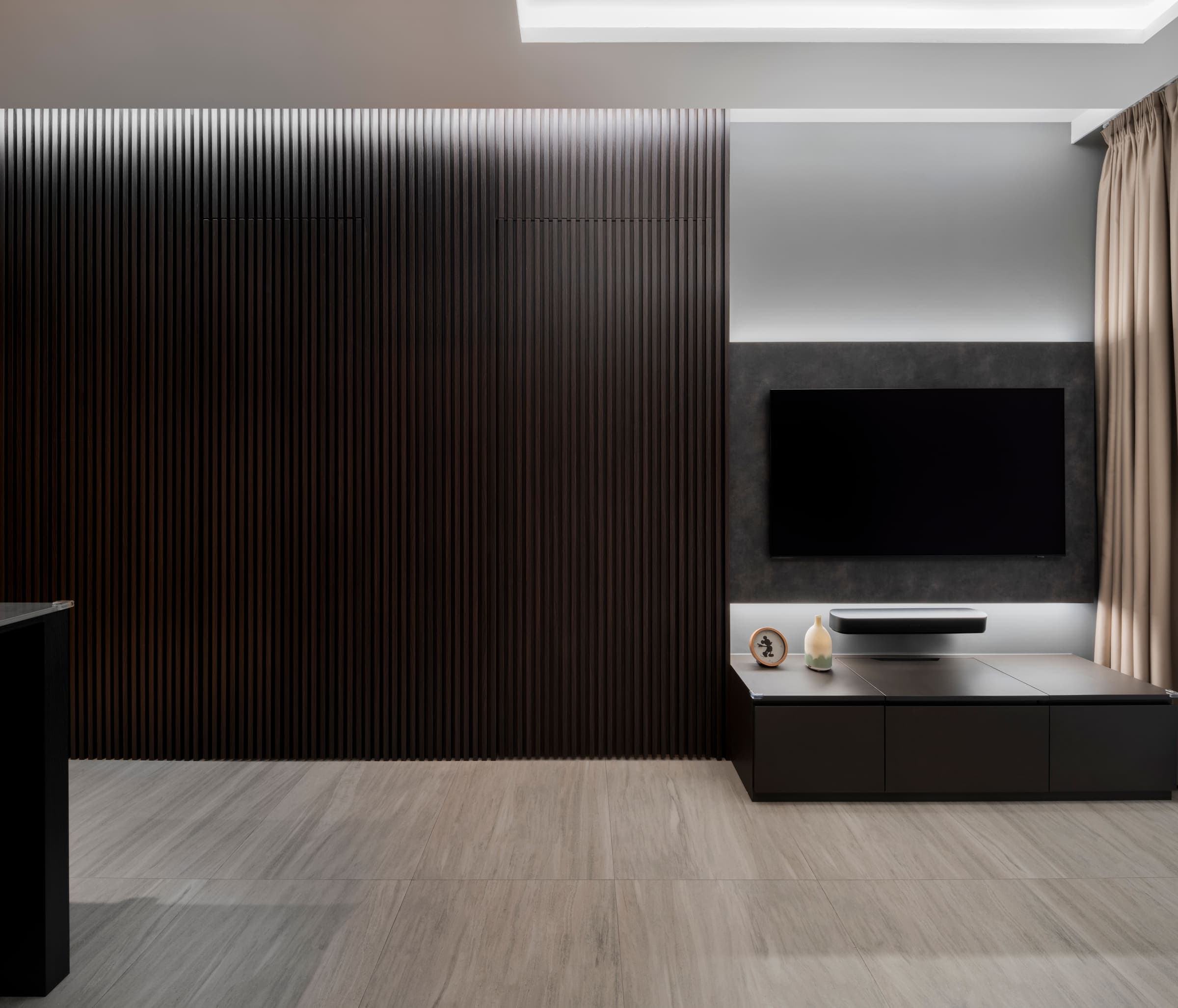 The same living room at the coolest setting, close to daylight, with the warmth gone from the floor and joinery.
